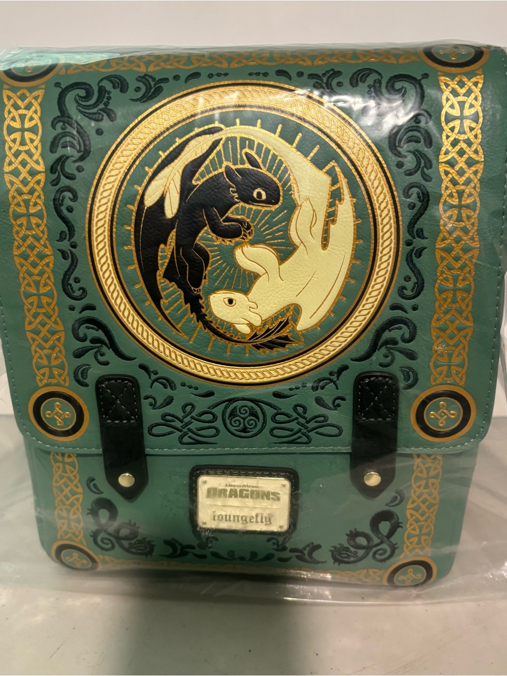Loungefly Teal and Gold Yin Yang Dragon Satchel backpack. How to train a dragon